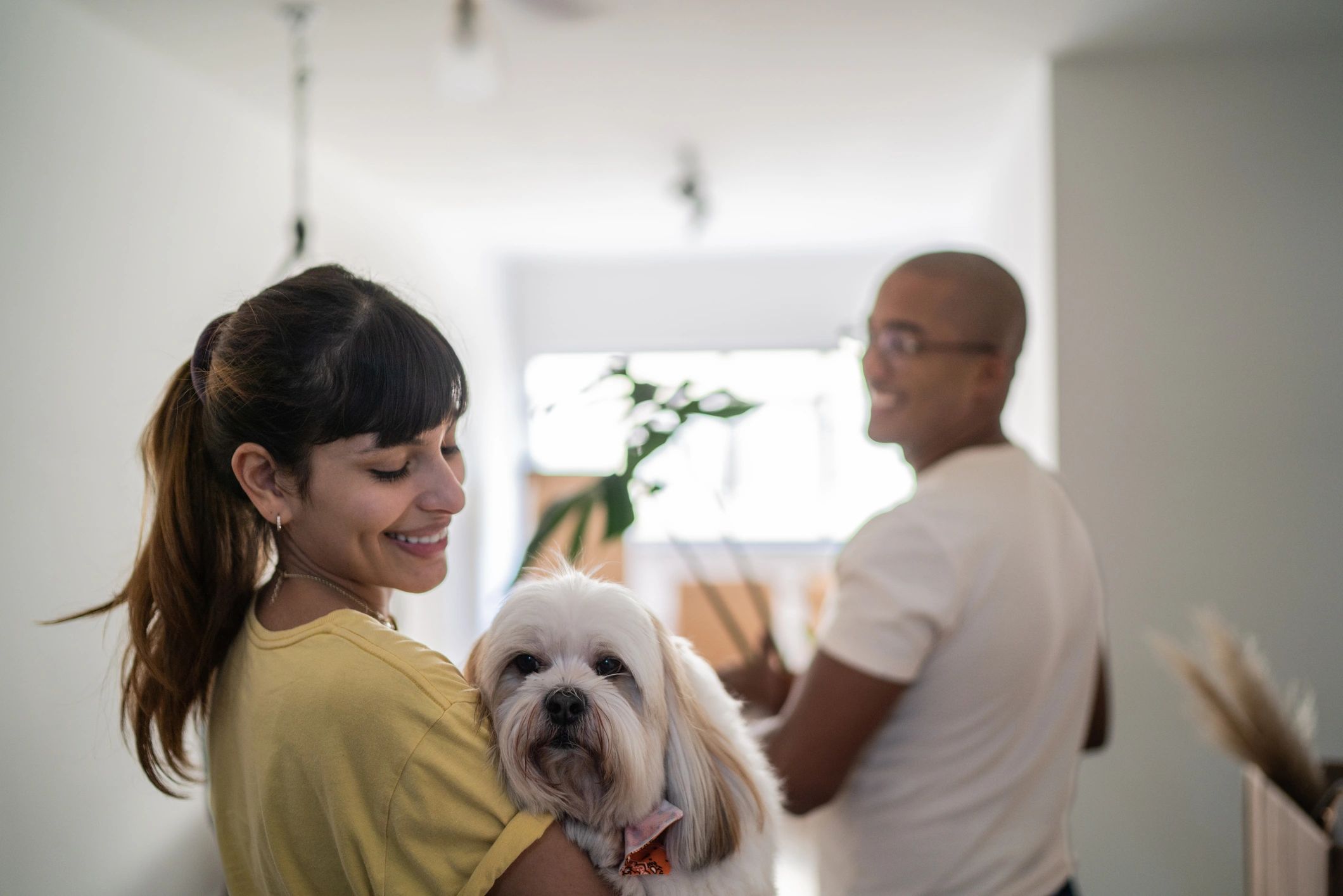 Woman with dog at home